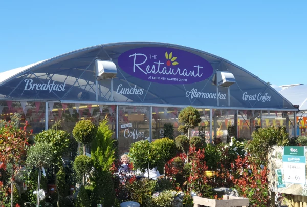 image of the garden restaurant outside with blue skies.