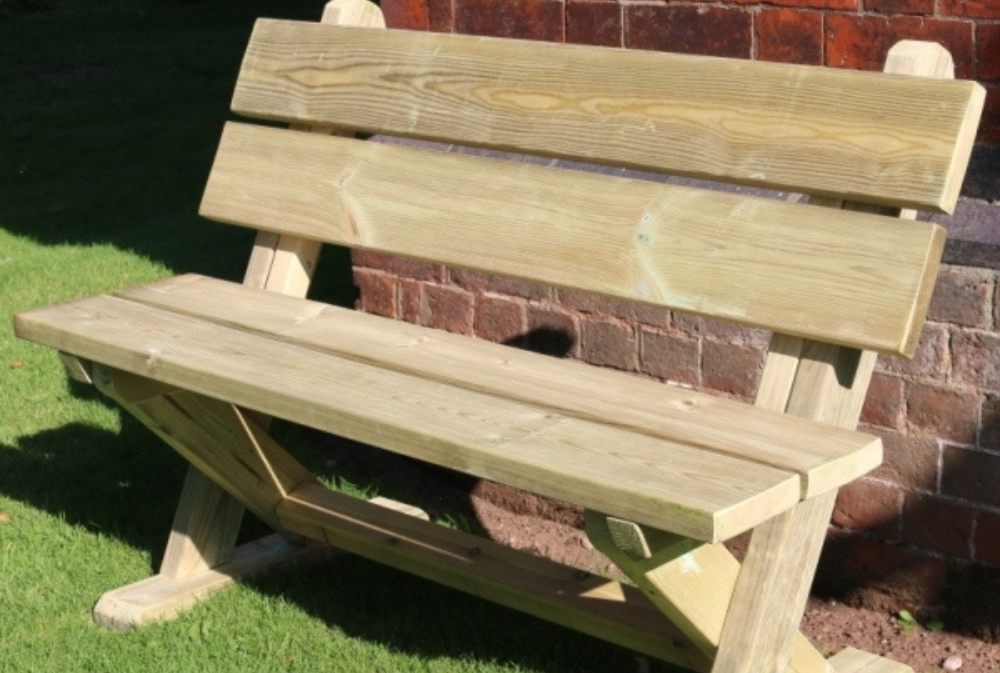 Wooden Ashcombe Bench in a garden.